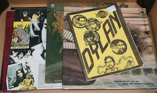 8 Bob Dylan early press LPs and early lyric book/press cuttings